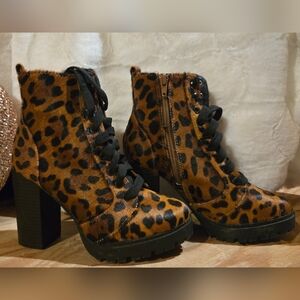 Express cheetah print heeled boots, size 5